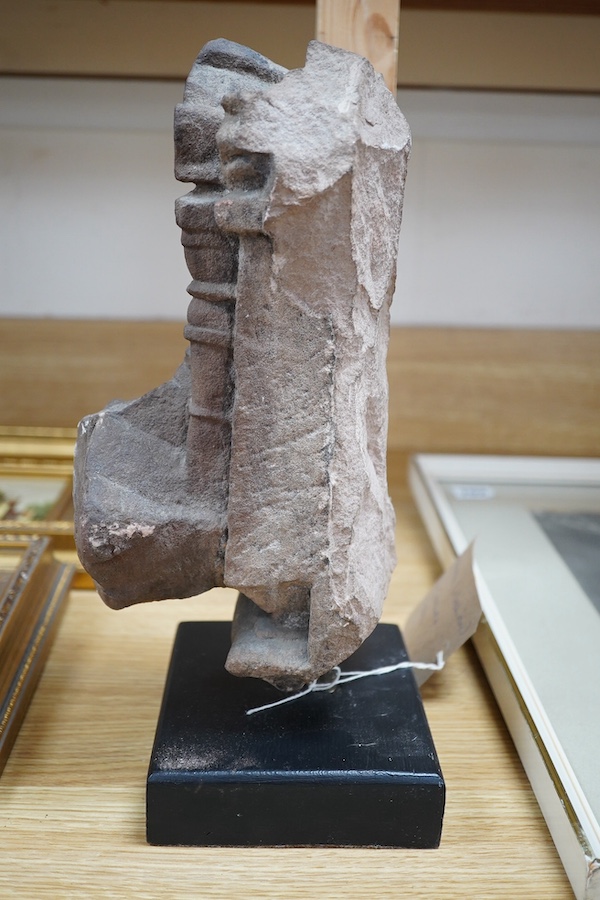 An Indian Hindu sandstone carving of Brahma the Creator, 14th century, 33cm high overall. Condition - commensurate with age